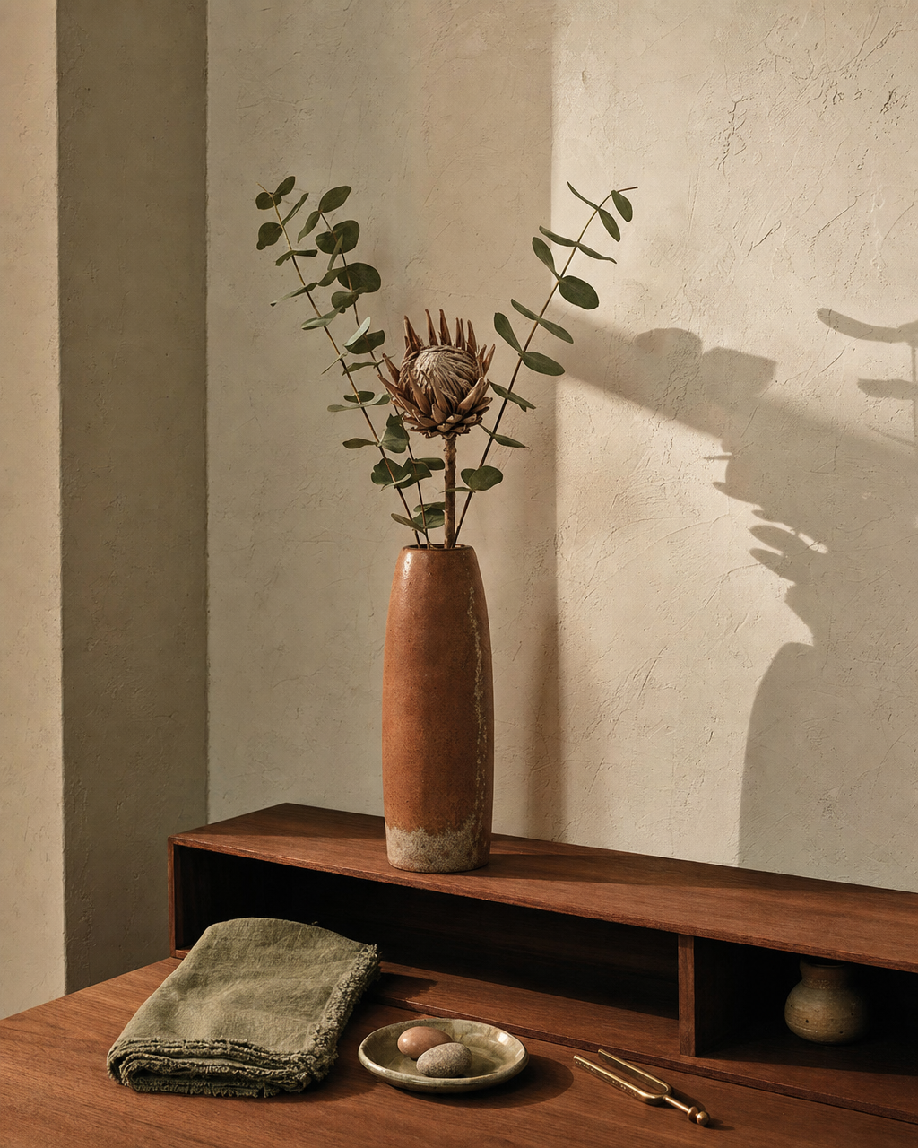 Calm spa interior detail, candlelight on linen